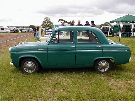[A green Ford Prefect]